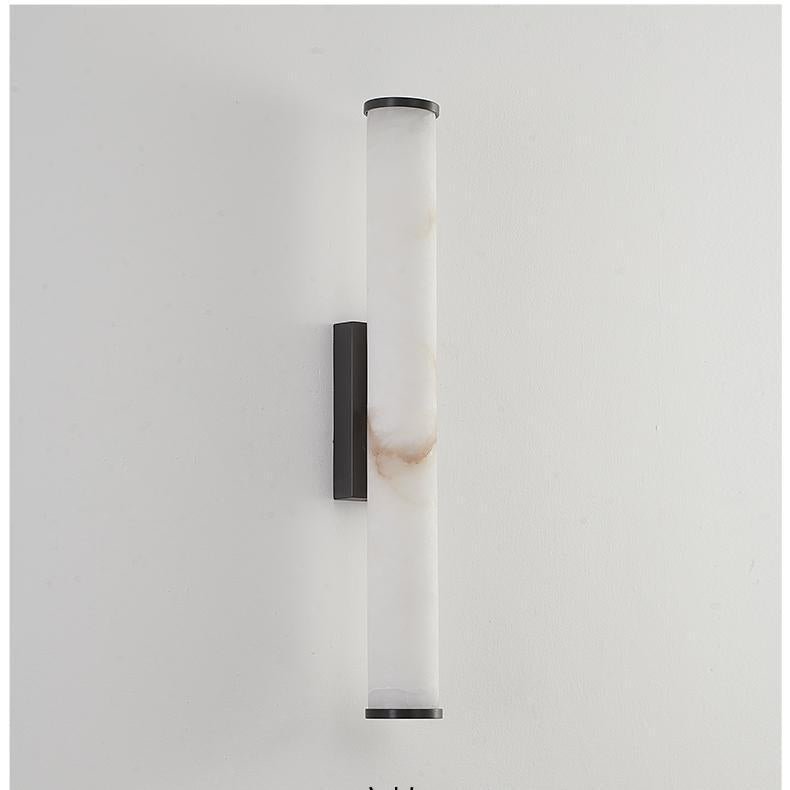 Unlit natural alabaster aerq wall sconce with black hardware showcasing its authentic raw stone texture