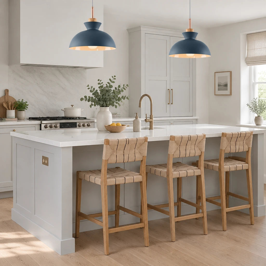 Two Alken blue dome pendant lights above a kitchen island in a modern British minimalist home