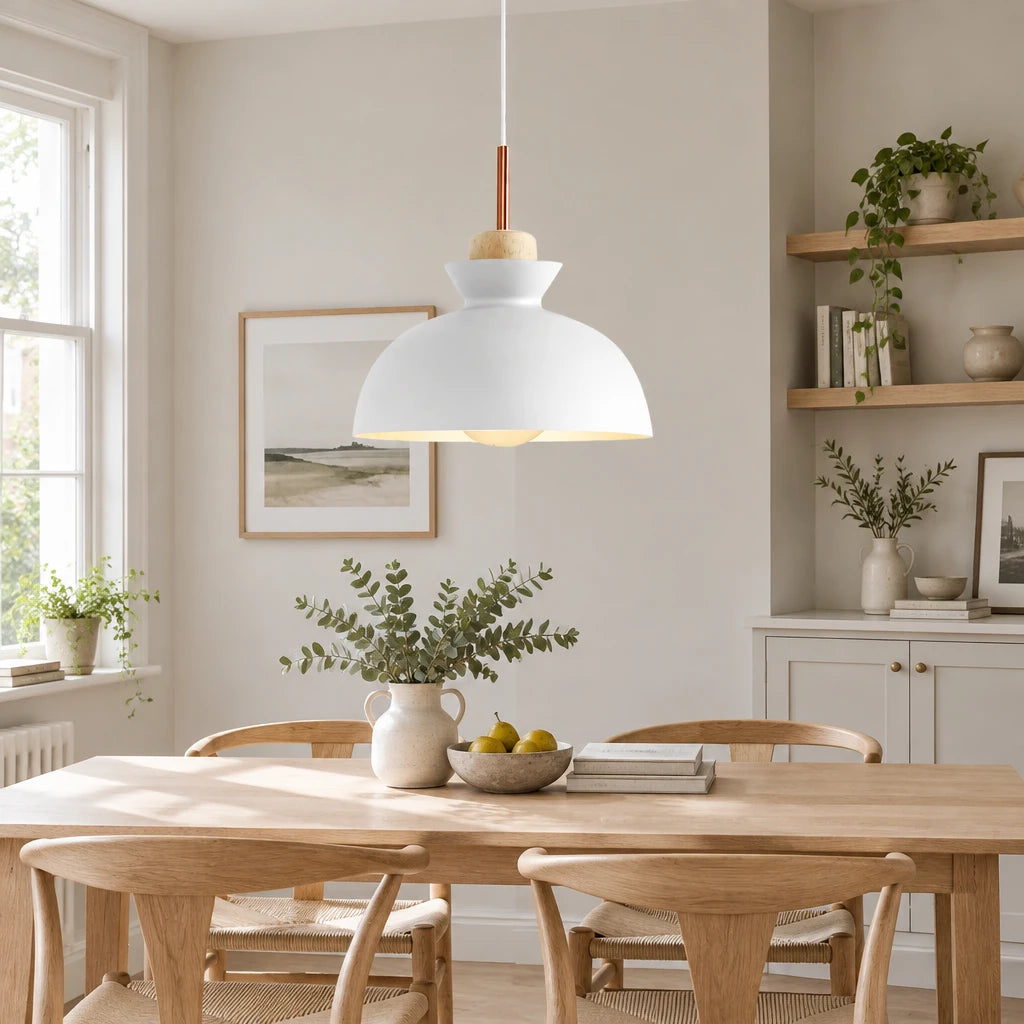 Alken white dome pendant light above a dining table in a modern British minimalist home