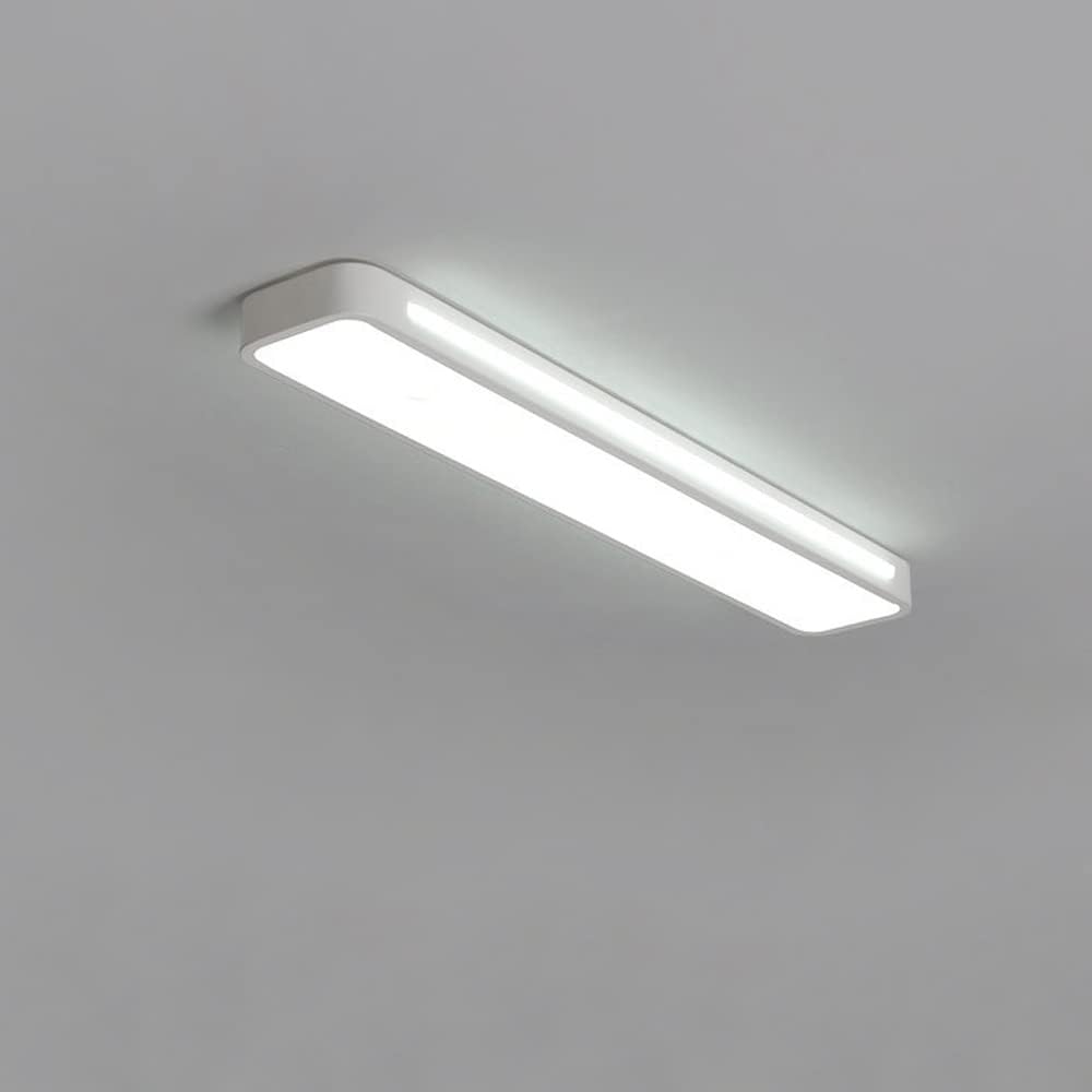 Ultra-thin minimalist white linear LED atio ceiling light fixture isolated on a grey background