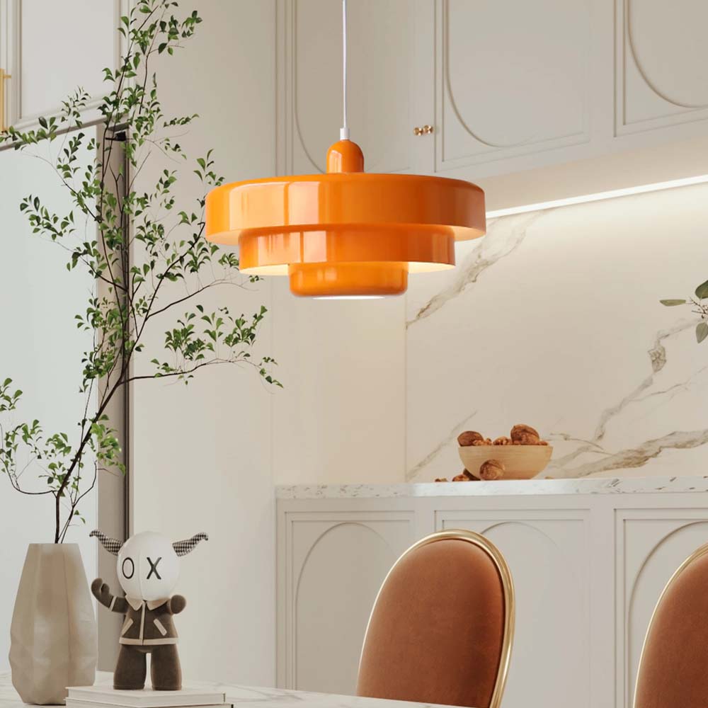 Modern orange layered balel ceiling lamp providing ambient lighting in a contemporary kitchen setting