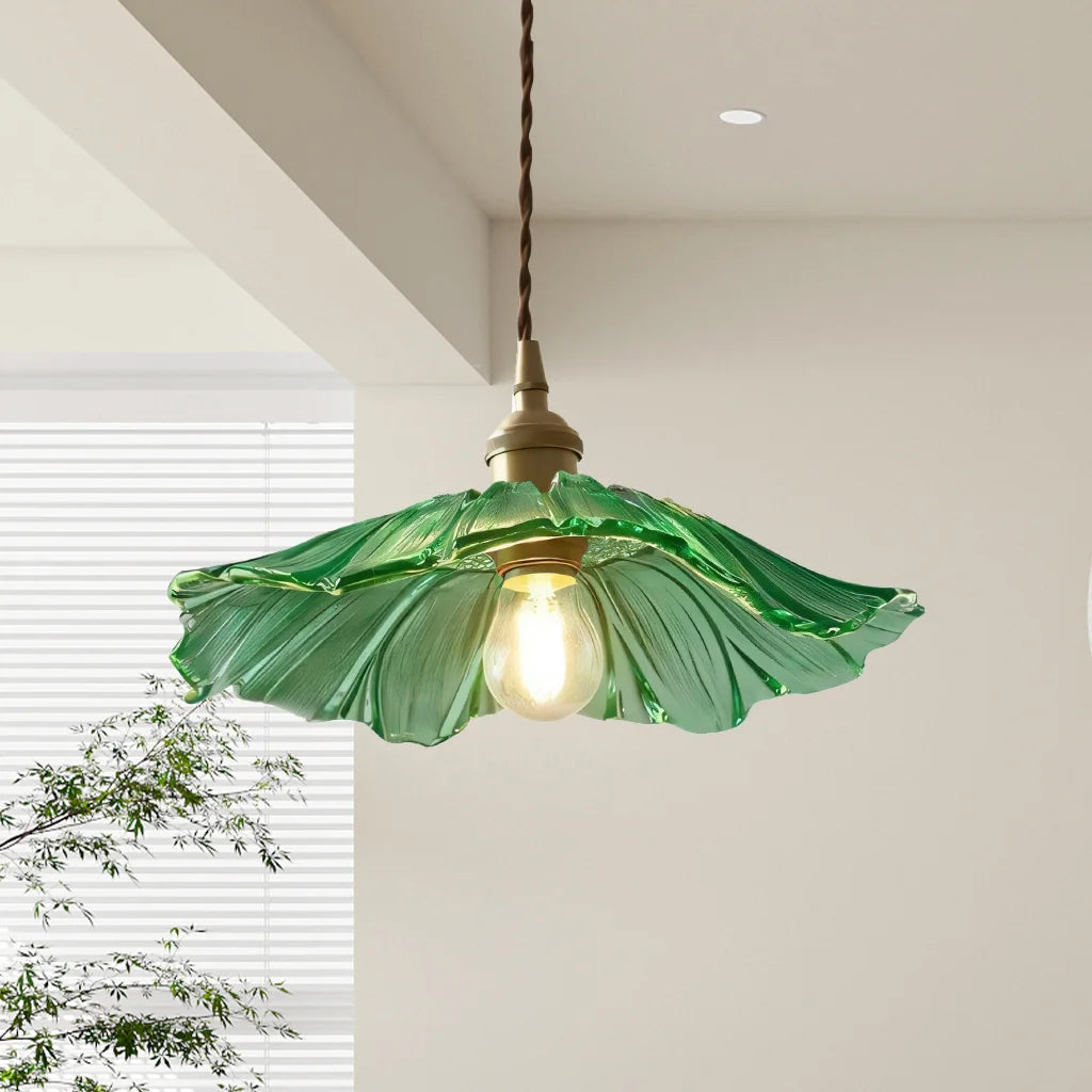 Green floral bila glass pendant light showcasing its wavy, hand-blown shade