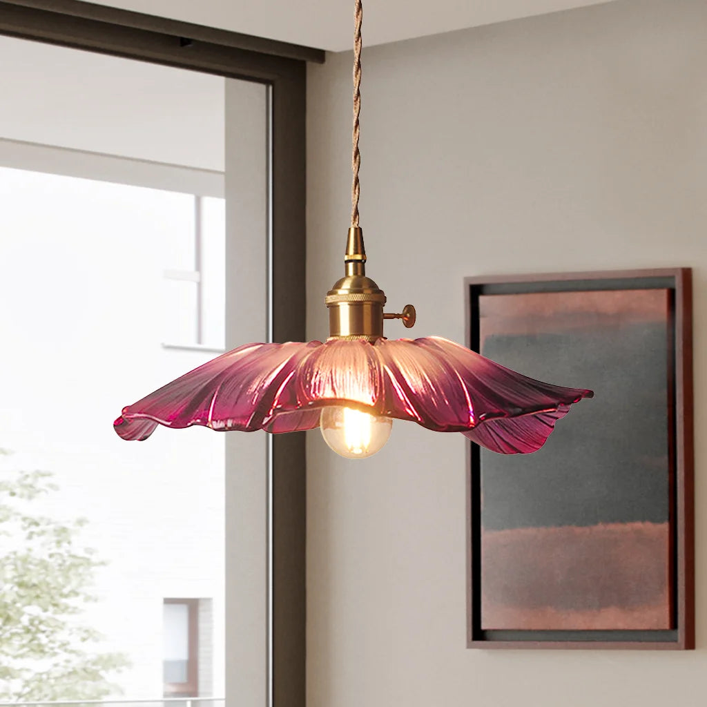 Purple bila lotus glass pendant styled in a modern, naturally lit interior space