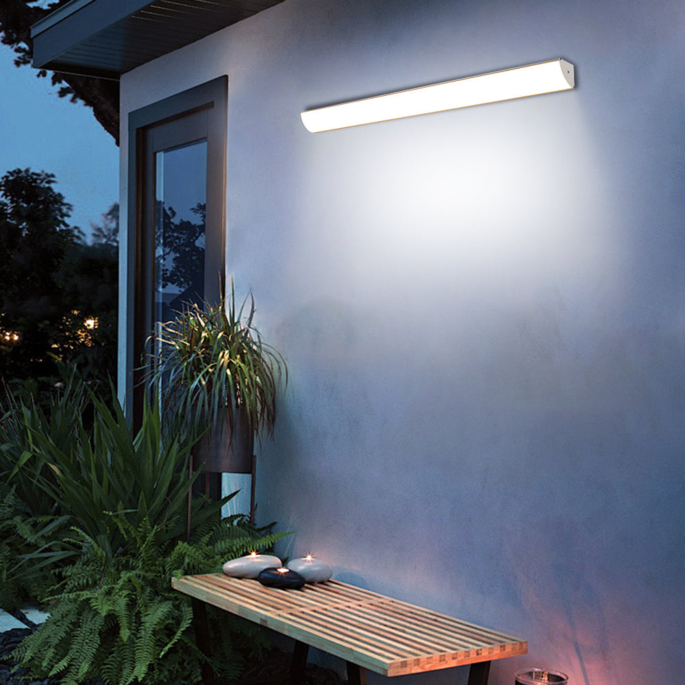 Linear garden bubce wall lighting providing ambient illumination over an outdoor seating area