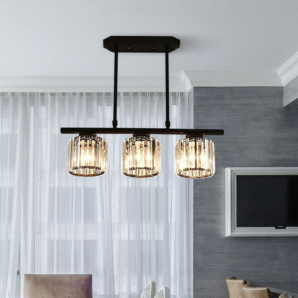 Black 3-light linear butel pendant with round ribbed glass shades in a bright living area