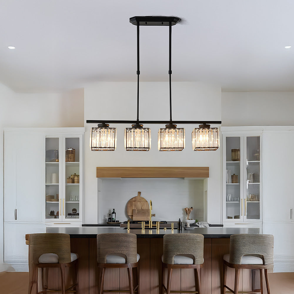 Black 4-light square glass butel island pendant in a bright, modern white kitchen space