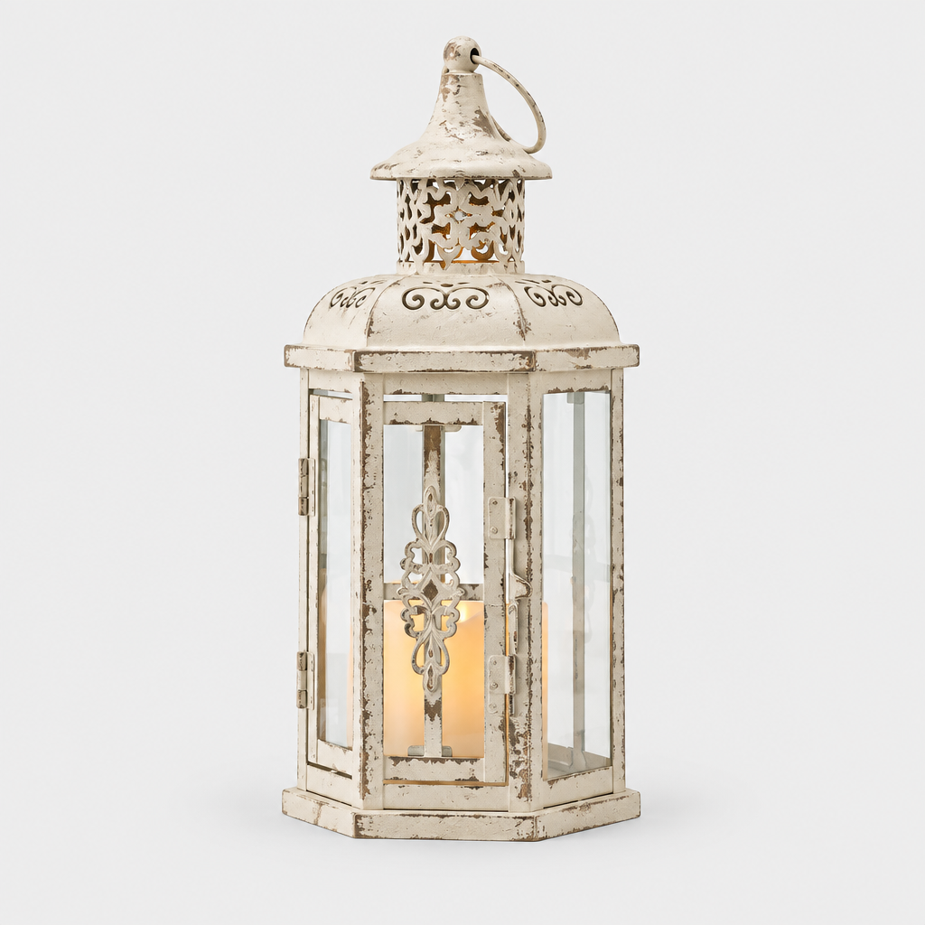 Cathedral vintage hexagonal glass candle lantern in distressed white finish, studio hero shot