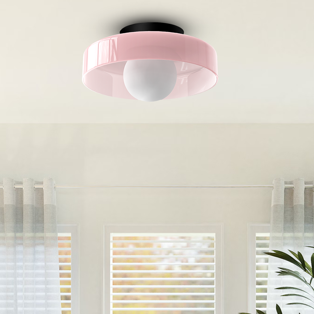 Soft pink macaron glass cenas ceiling light adding a pastel touch to a bright room