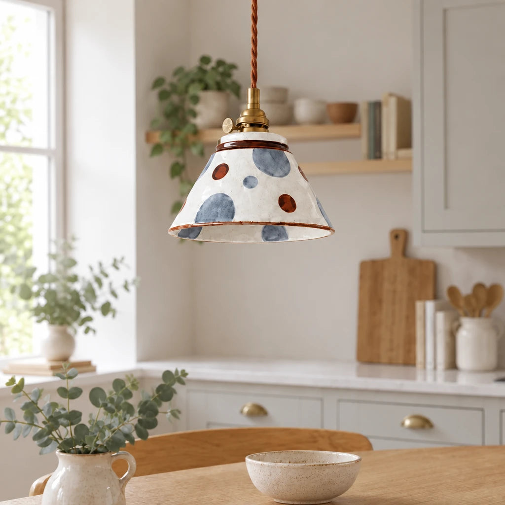 Cend Polka hand-painted ceramic pendant light, centered, in a modern British minimalist kitchen