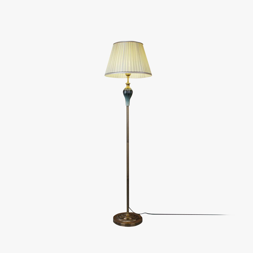 Vintage beige pleated fabric cerf floor lamp isolated on a clean white background