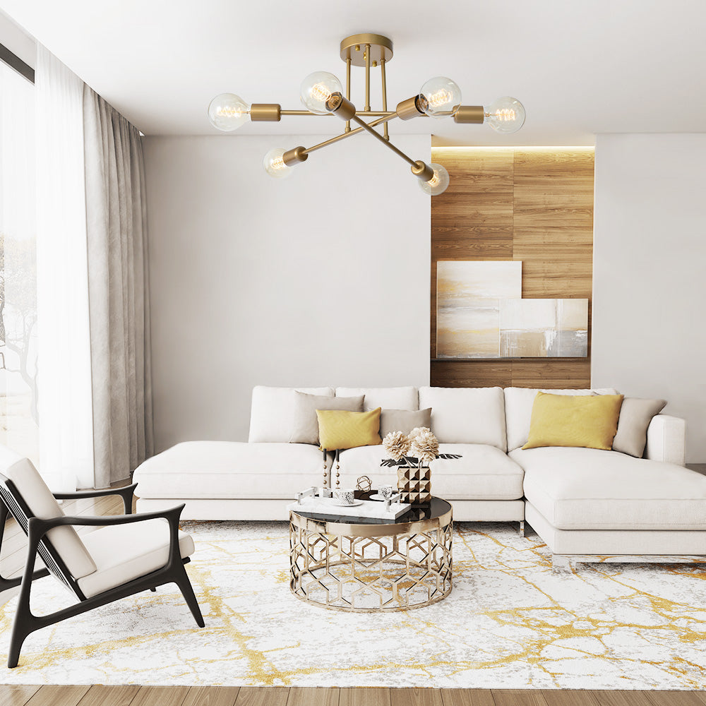 6-arm gold starburst dubce ceiling lamp illuminating a bright, spacious living room with a white sectional sofa