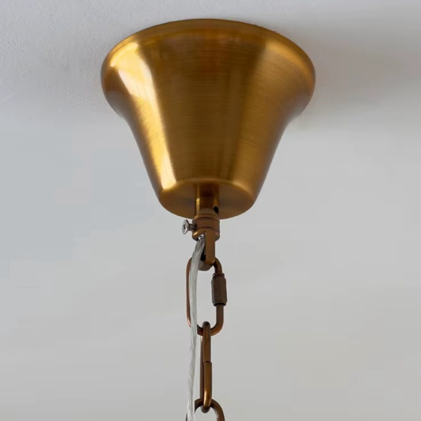 Elur brass-finish iron chandelier ceiling canopy and chain with quick-connect link, close-up