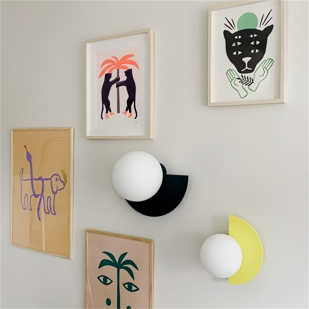 White, black, and yellow geometric accent fers lights integrated seamlessly into a modern art gallery wall