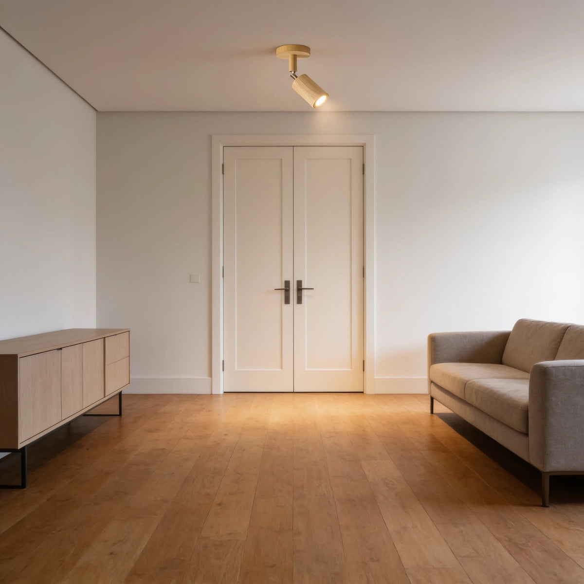 Flar 1 head natural wood ceiling spotlight in a modern British living room