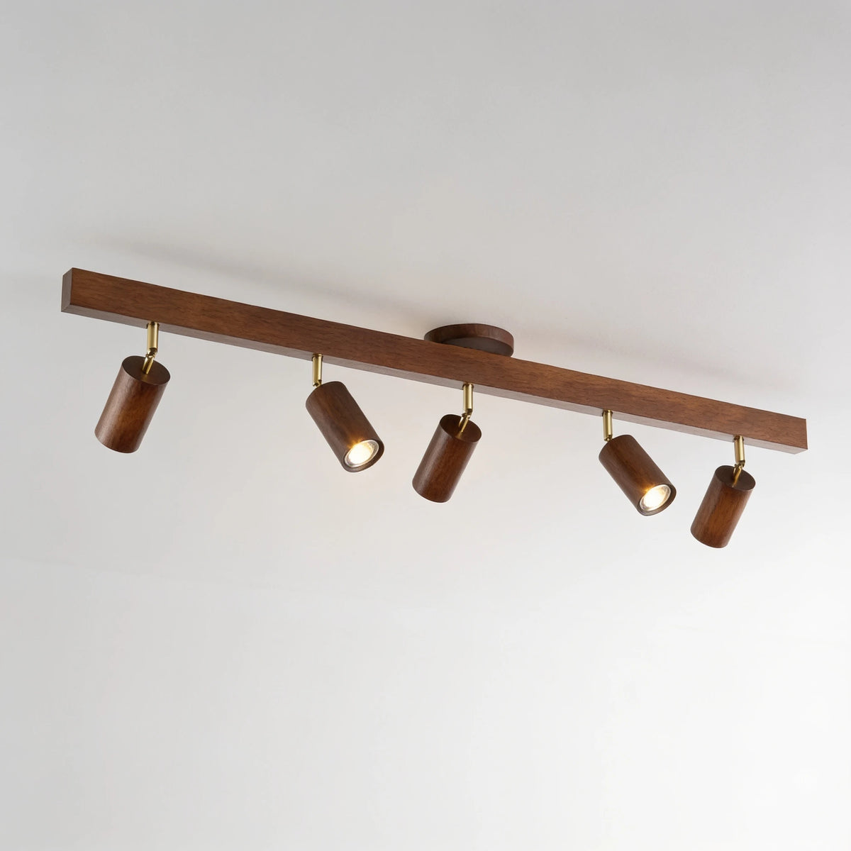 Flar 5 head walnut ceiling spotlight bar, studio view