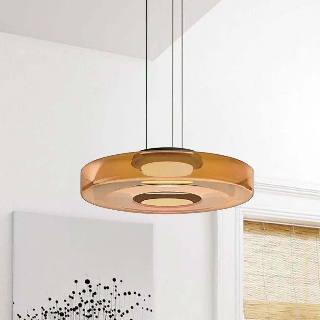 Modern fujs 1-layer amber tiered glass pendant light suspended in a bright room