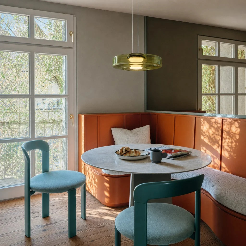 Green fujs 1-layer Nordic glass pendant light illuminating a cosy modern dining nook