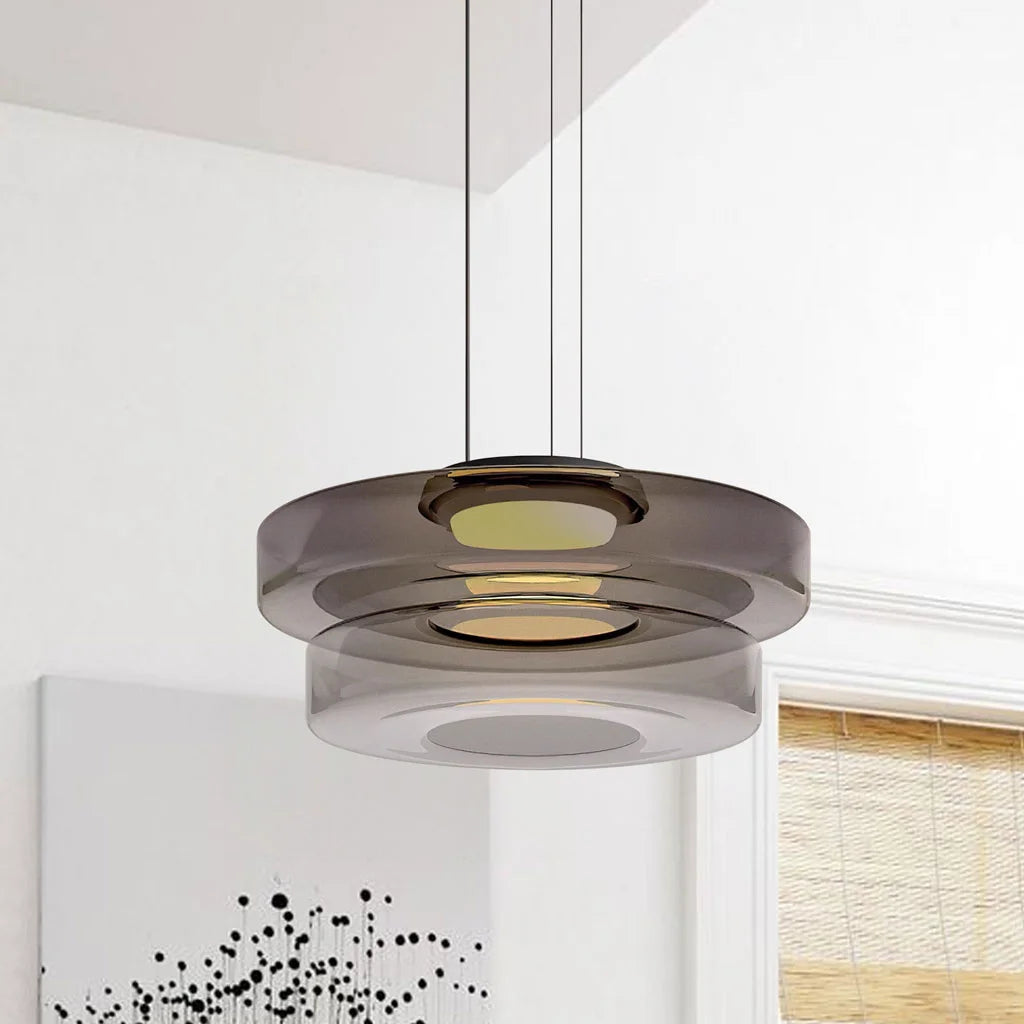Smoke grey 2-layer fujs glass ceiling light suspended against a minimalist interior wall