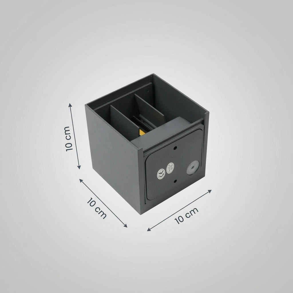 Glim black square outdoor wall light with 10cm x 10cm x 10cm dimensions shown on a grey studio background