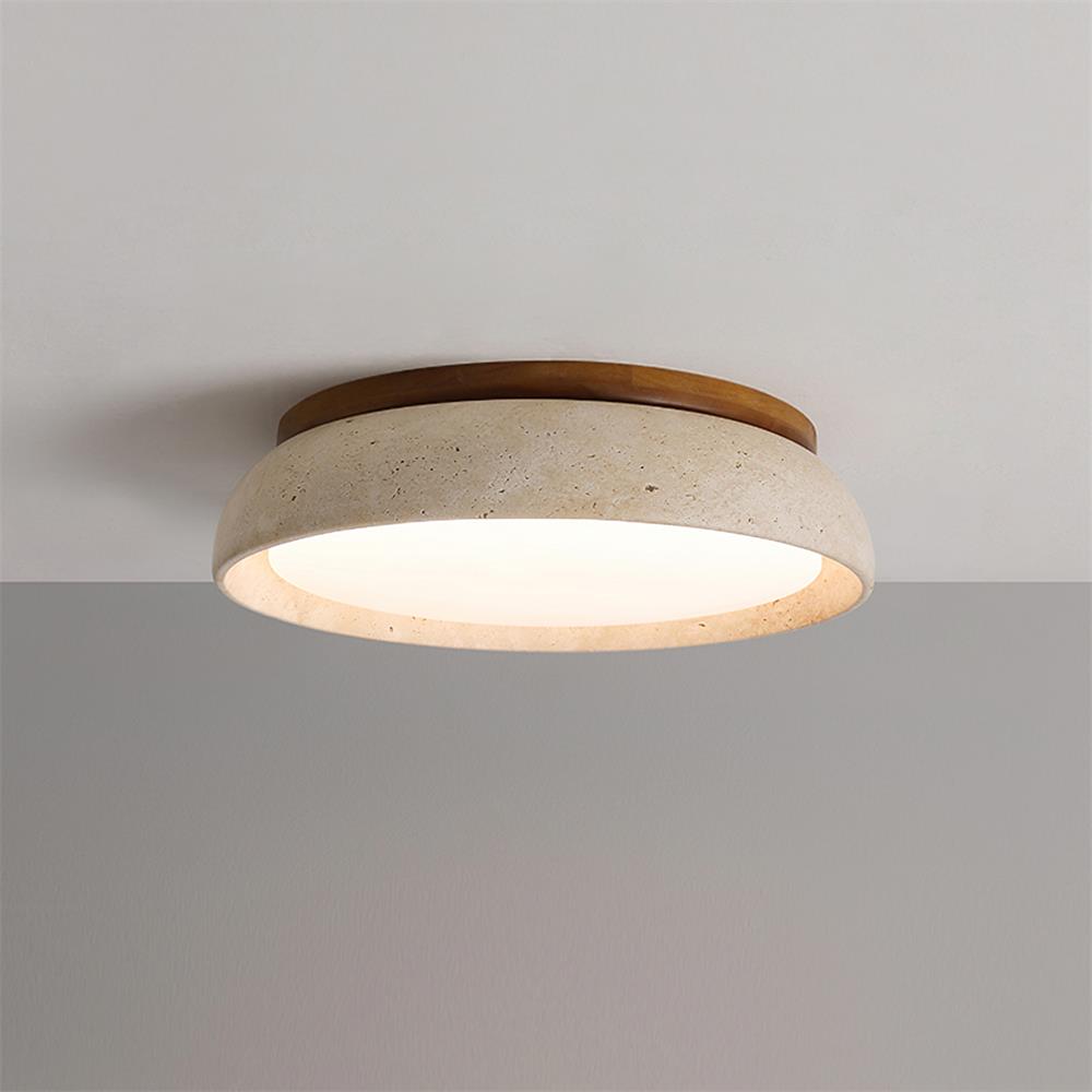 Left angled view of the glowing travertine stone gugs LED flush mount