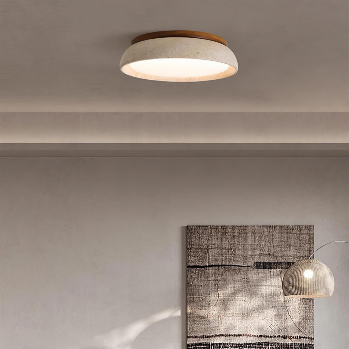 Wabi-Sabi stone gugs ceiling light installed against a neutral textured wall