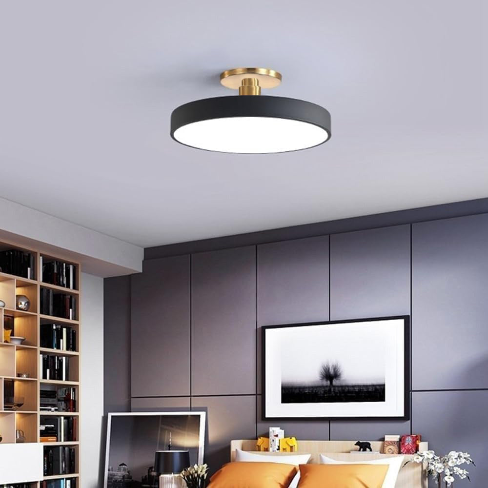Black macaron drum guoj ceiling light adding a contemporary touch to a living room
