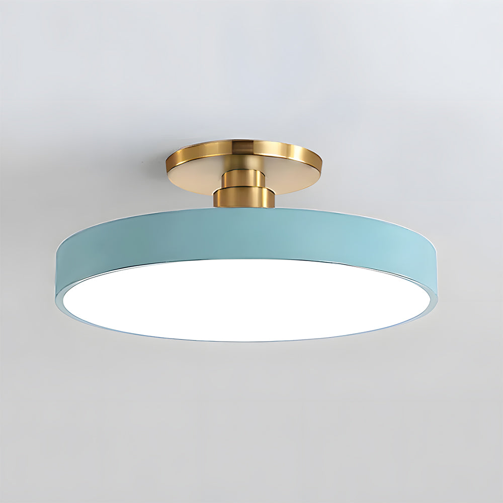 Light blue macaron drum guoj ceiling light isolated against a plain white background