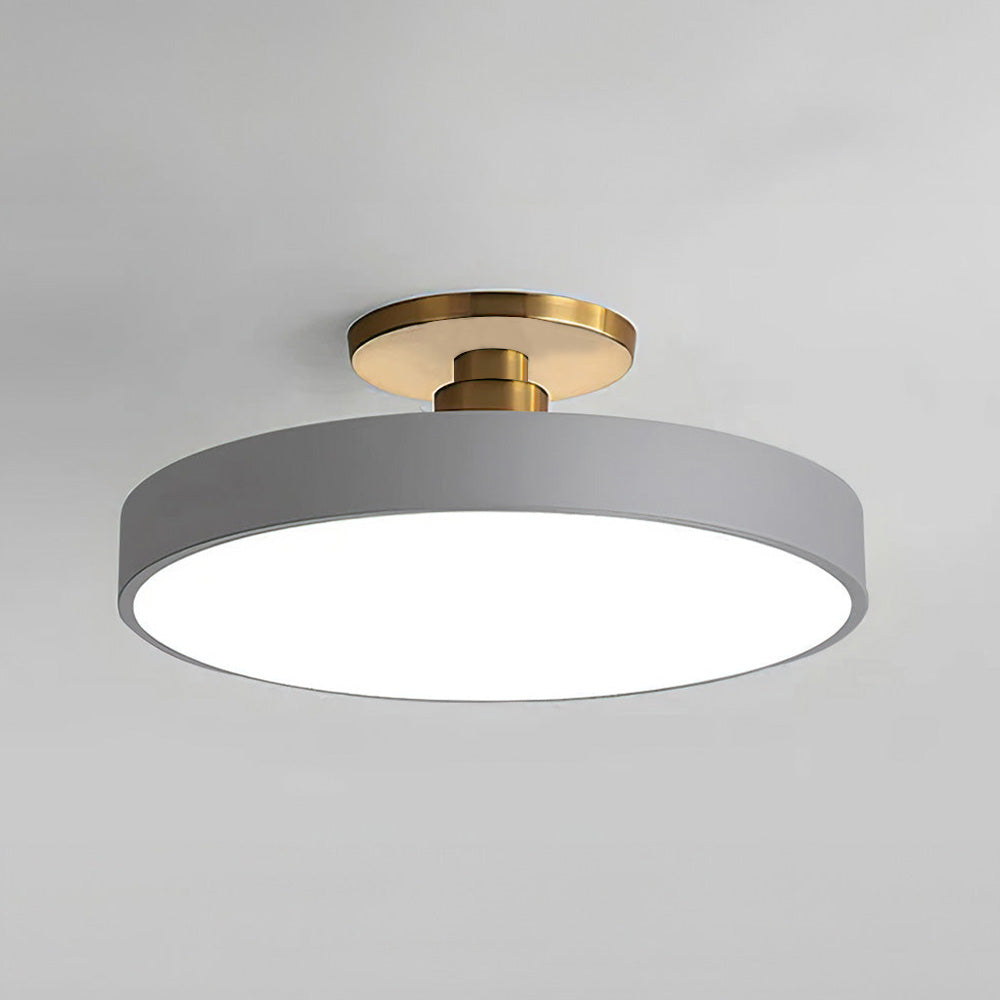 Sleek grey minimalist drum guoj ceiling lamp featuring a gold canopy and frosted acrylic diffuser