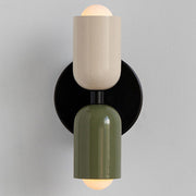 Modern hutre beige and green colour-block glass wall sconce with a double-head capsule design