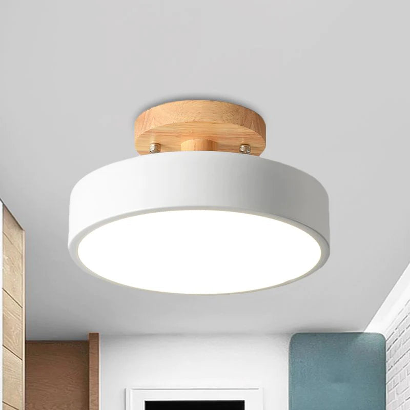 Close-up of the sleek white round wood semi flush mount huty ceiling light