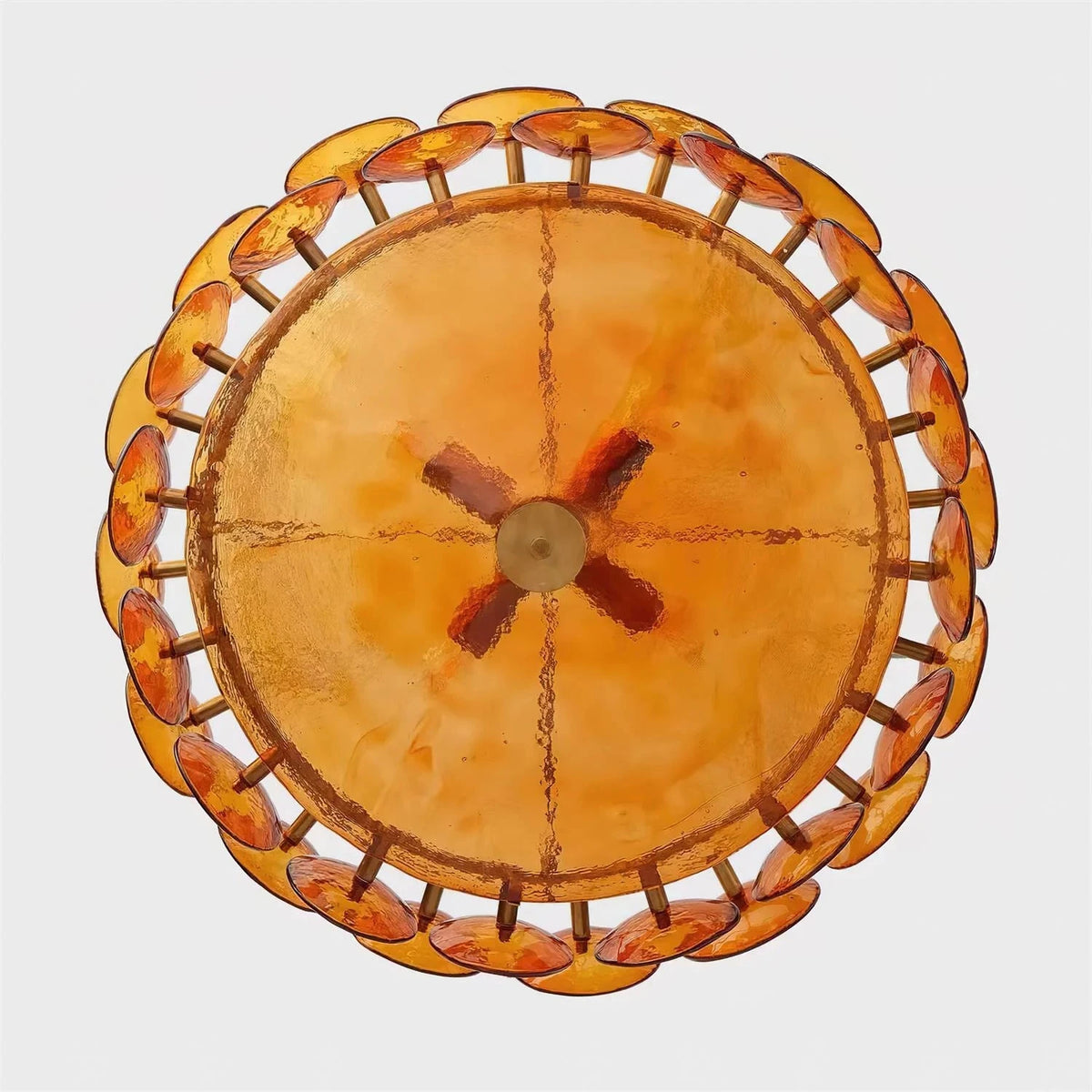 Joltly amber glass disc chandelier unlit, seen from below