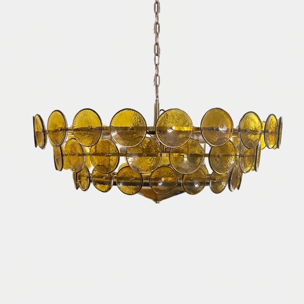 Joltly green glass disc chandelier with gold-finish frame on a light background