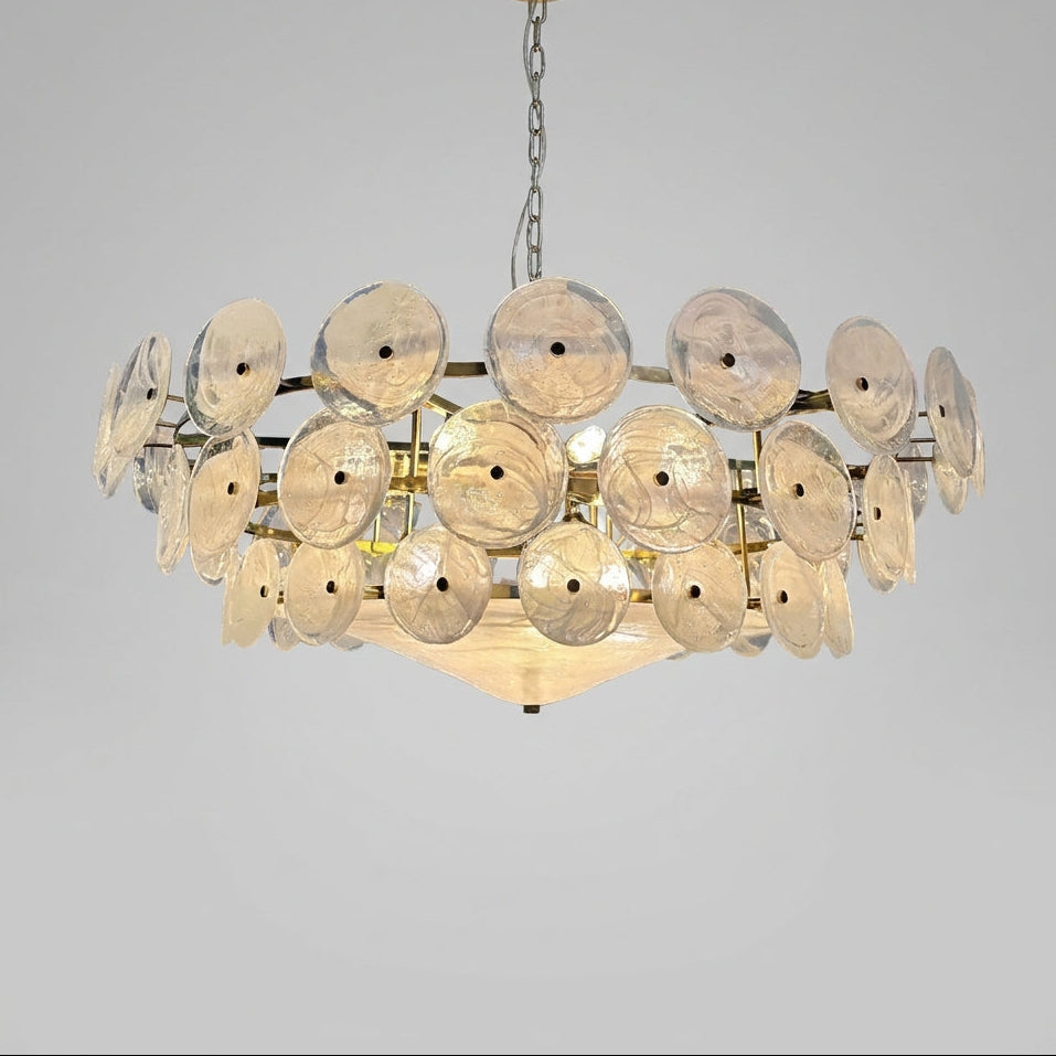 Joltly white frosted glass disc chandelier with gold-finish frame on a light grey background