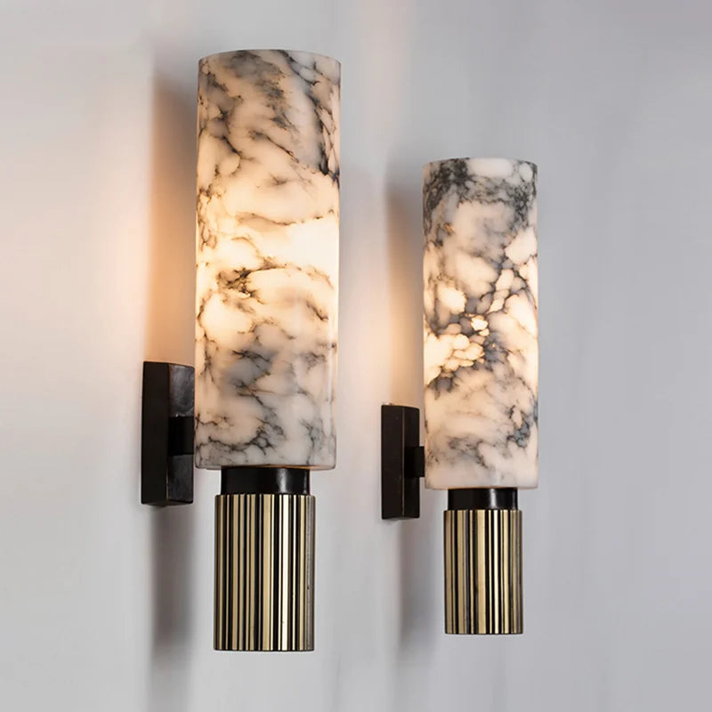 Close-up of the natural marble kopu wall lights highlighting the unique organic stone veining and illuminated core