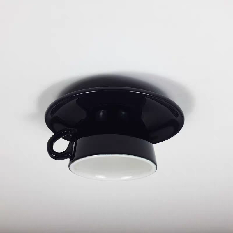 Sleek black ceramic teacup kupce ceiling light for a modern, playful aesthetic