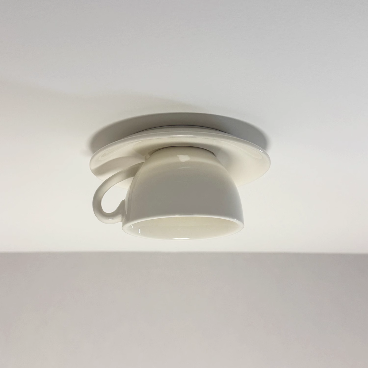 Clean white ceramic teacup flush mount kupce light, perfect for a modern minimalist kitchen