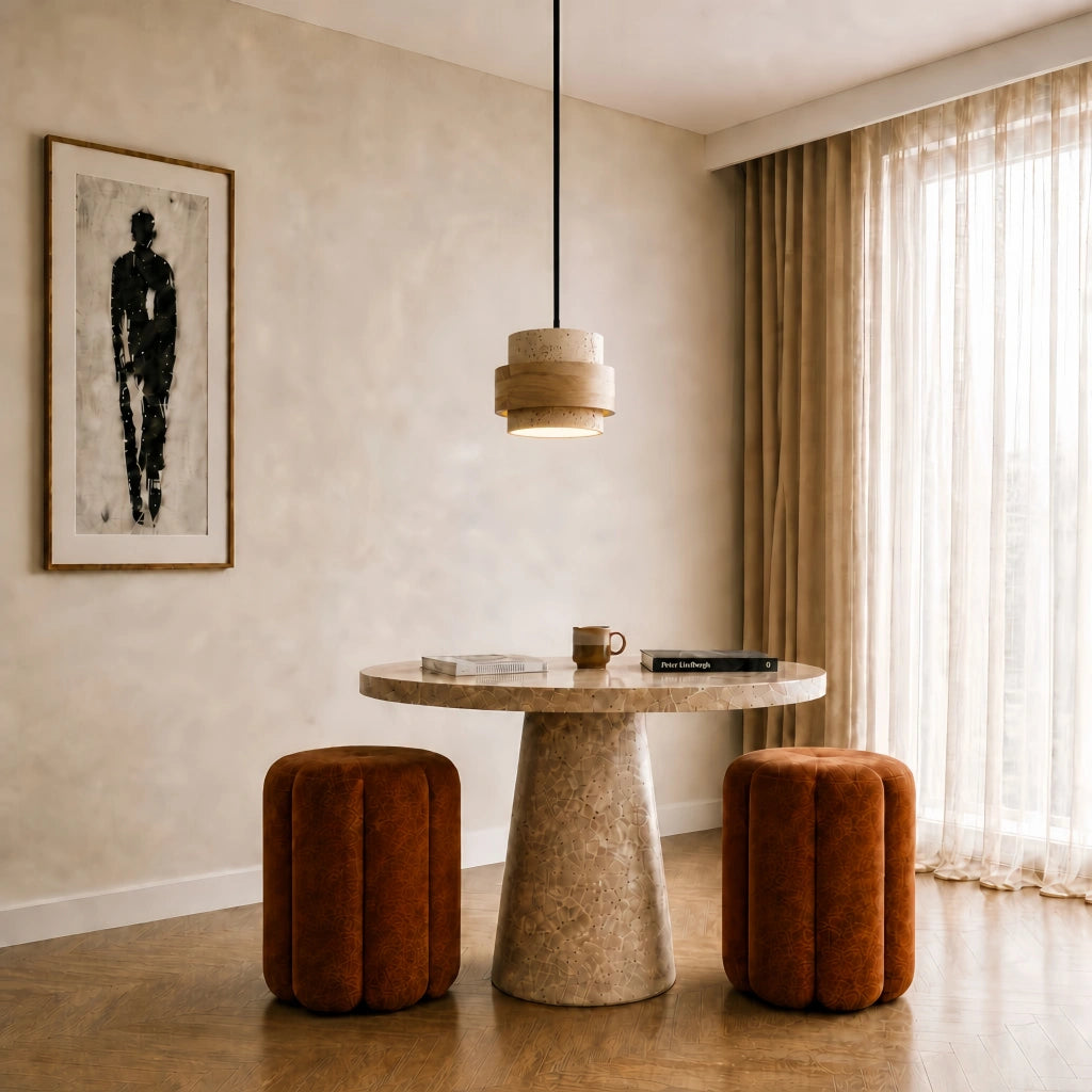 Single natural wood and travertine kyra pendant light over a small round dining nook