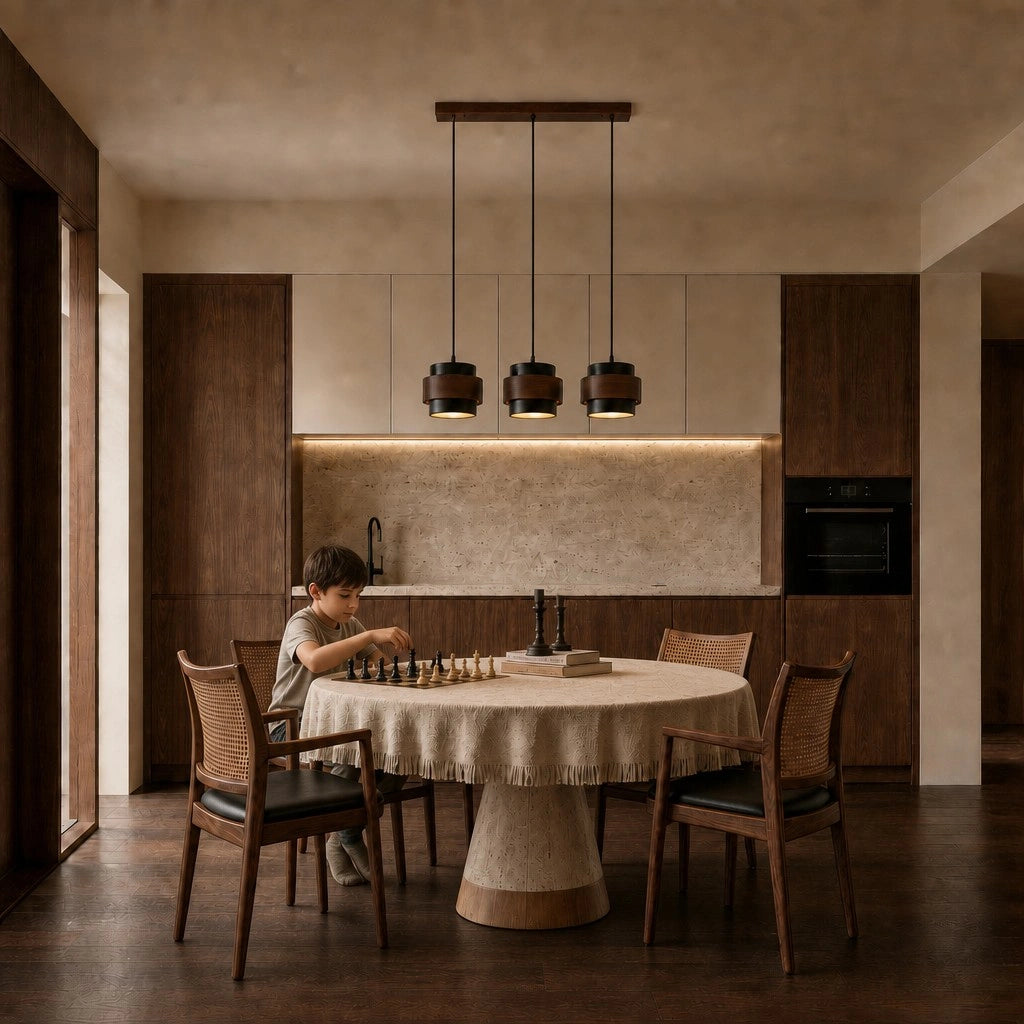3-head dark wood and travertine kyra pendant providing warm ambient lighting in a dining room