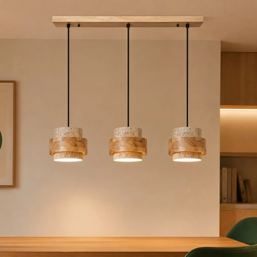 3-head kyra natural wood and travertine pendant hanging over a minimalist dining area
