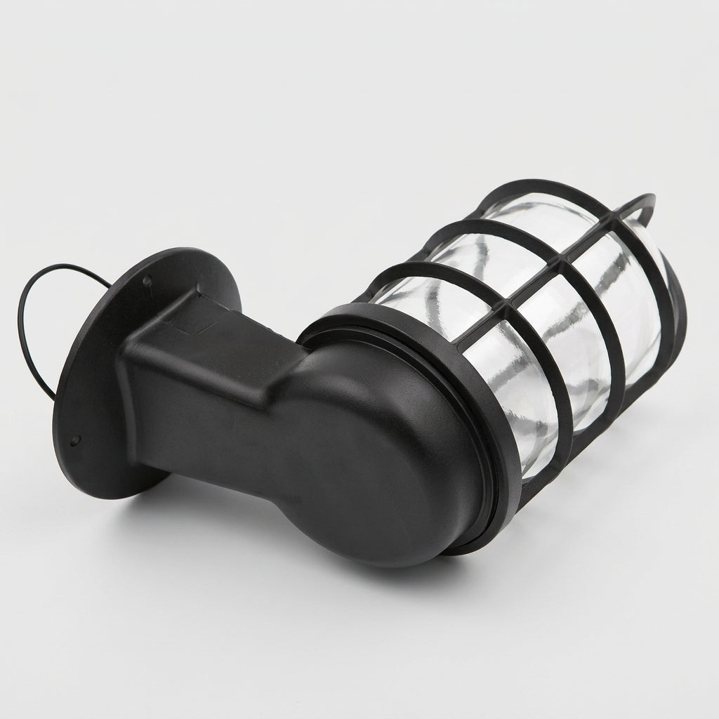 Laze black cage guard bulkhead wall light seen from the side on a white background