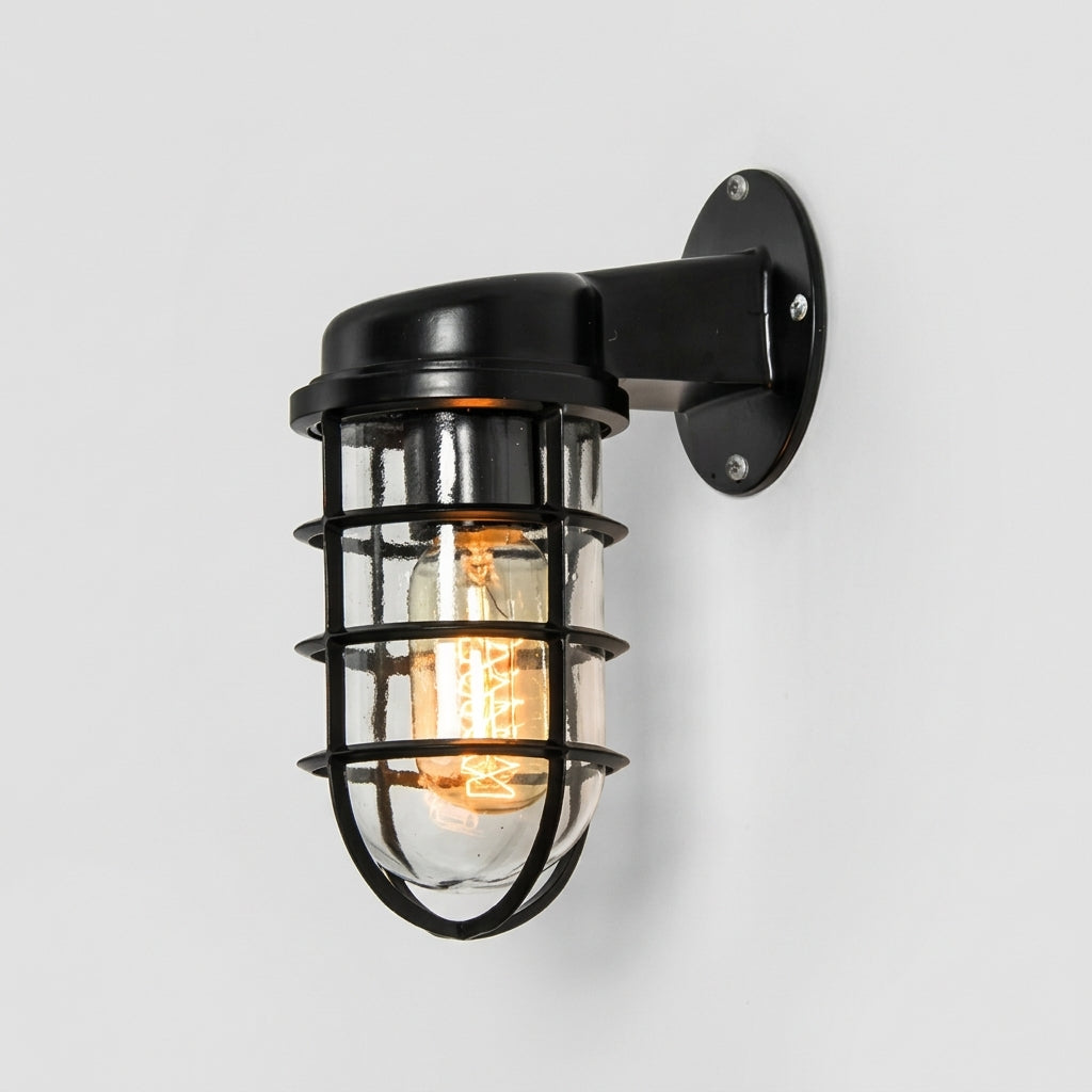 Laze black cage guard bulkhead wall light lit on a light grey background