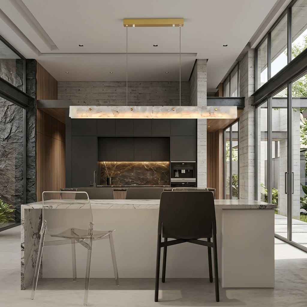 Levon alabaster linear chandelier with brass canopy above the dining area of a modern kitchen