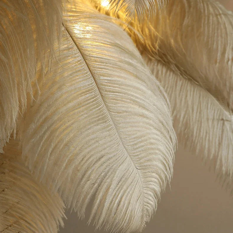Close-up of the Lorne khaki ostrich feathers lit by a warm glow