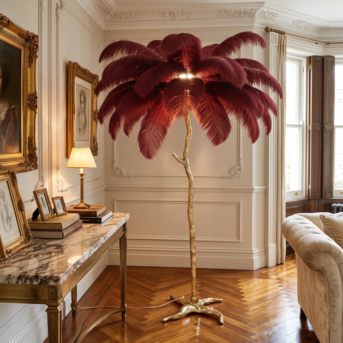 Lorne red ostrich feather floor lamp in a cream townhouse corner with a marble console and gilt-framed art