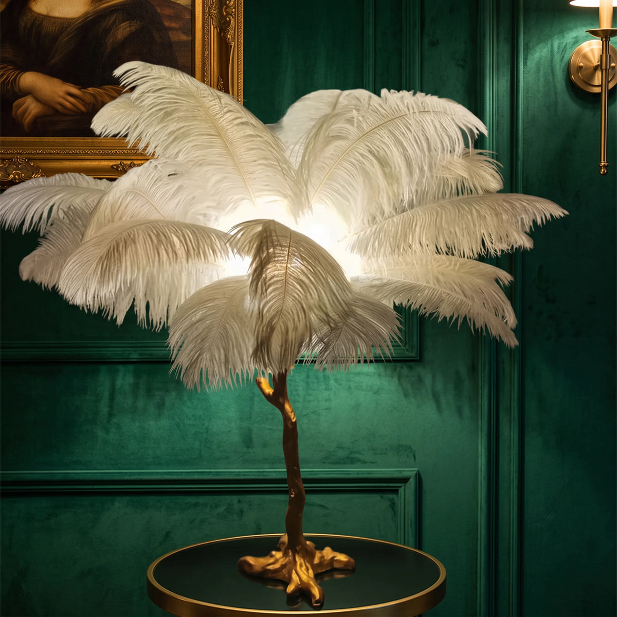 Close-up of the Lorne white ostrich feather lamp glowing against an emerald green velvet wall