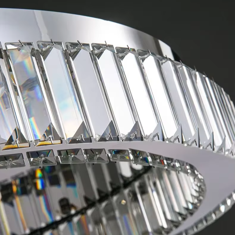 Detailed view of the silver-tone frame and crystal facets on the halo luba ceiling lamp