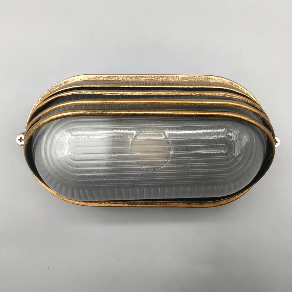 Lude bronze cage guard bulkhead wall light seen from the front on a light background