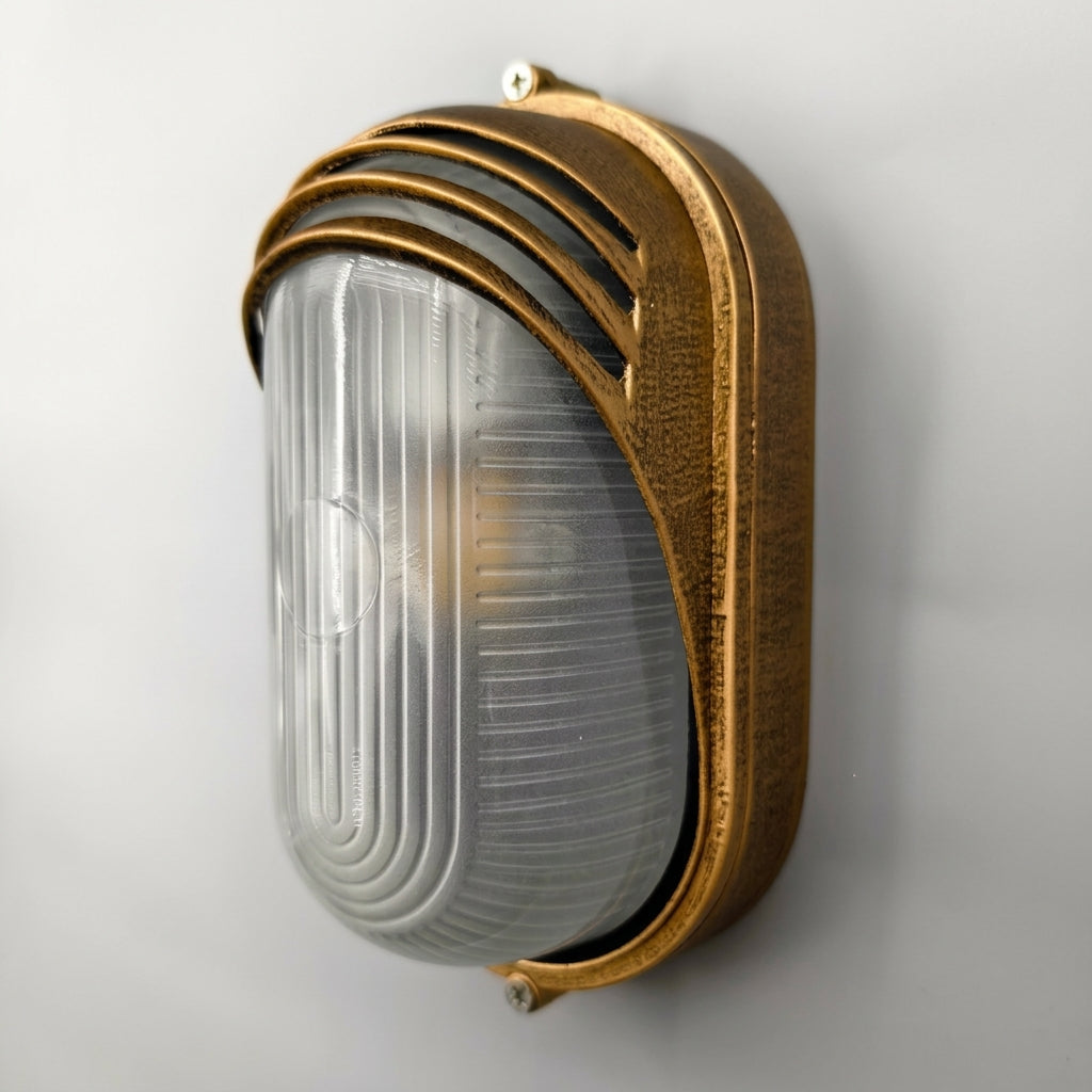 Lude louvred hood bulkhead wall light with ribbed frosted glass on a light background