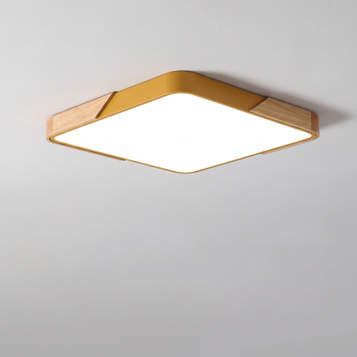 Mavon apricot yellow square slim LED flush mount ceiling light with wood corner trim, fitted flat to a ceiling