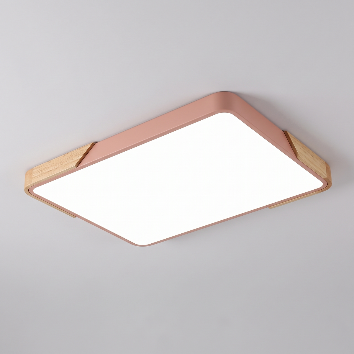 Mavon peach pink rectangular slim LED flush mount ceiling light with wood corner trim, fitted flat to a ceiling